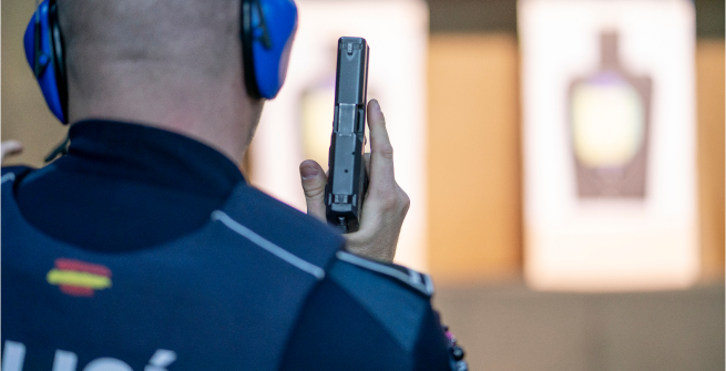 Law enforcement officer training in a tactical scenario
